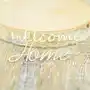 Napis 'welcome home' Sklep